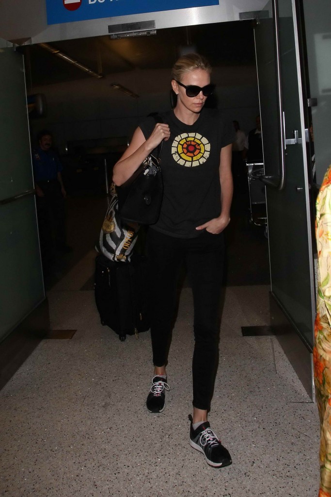 Charlize Theron Arriving at LAX Airport 8/28/2015-1