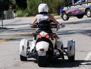 Miley Cyrus Goes for a Cruise on a Three-Wheeler-3