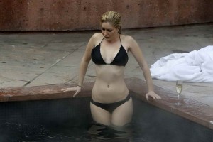 HEIDI MONTAG in Bikini on the Pool in Aspen-3