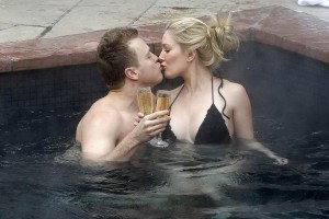 HEIDI MONTAG in Bikini on the Pool in Aspen-9