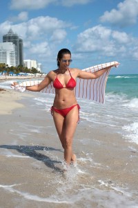 Padma Lakshmi in a Red Bikini at the Beach in Miami -7