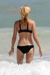 Laura Vandervoort in a Black Bikini at the Beach in Mexico 03/28/2016-3