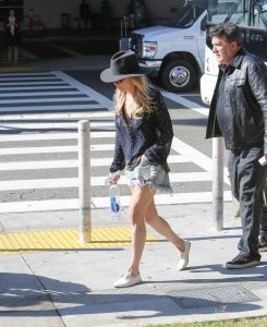 The 33-year-old country singer LeAnn Rimes, who covered the multi-Platinum single "Blue" at the age of thirteen, arrives at LAX Airport in Los Angeles.-3