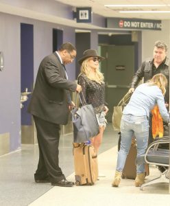 The 33-year-old country singer LeAnn Rimes, who covered the multi-Platinum single "Blue" at the age of thirteen, arrives at LAX Airport in Los Angeles.-5