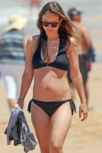 Olivia Wilde in a Black Bikini at the Beach in Hawaii 04/22/2016-2