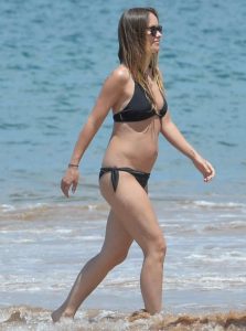 Olivia Wilde in a Black Bikini at the Beach in Hawaii 04/22/2016-3