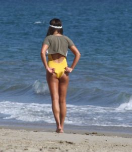 Lea Michele Wearing a Yellow Swimsuit at the Beach in Malibu 09/01/2016-5