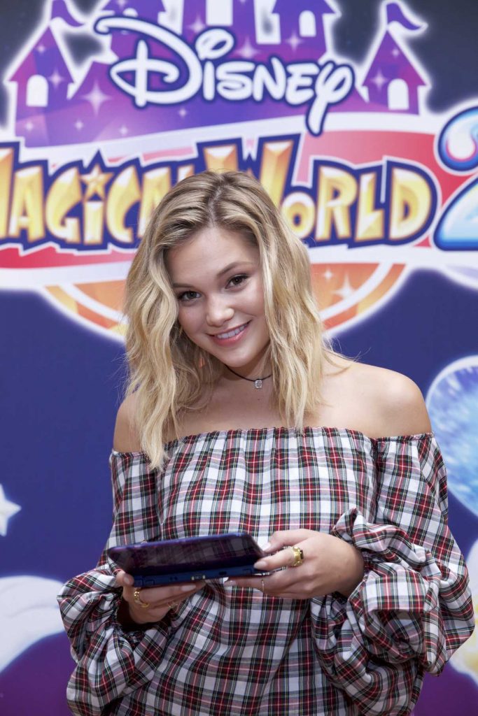 Olivia Holt Celebrates the Upcoming Launch of the Disney Magical World 2 Game at Nintendo in New York 10/01/2016-1