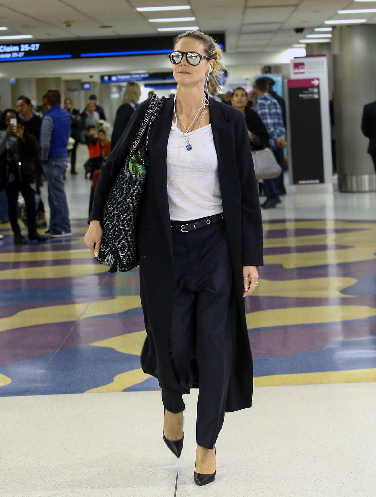 Heidi Klum Arrives at Miami International Airport 11/28/2016-2