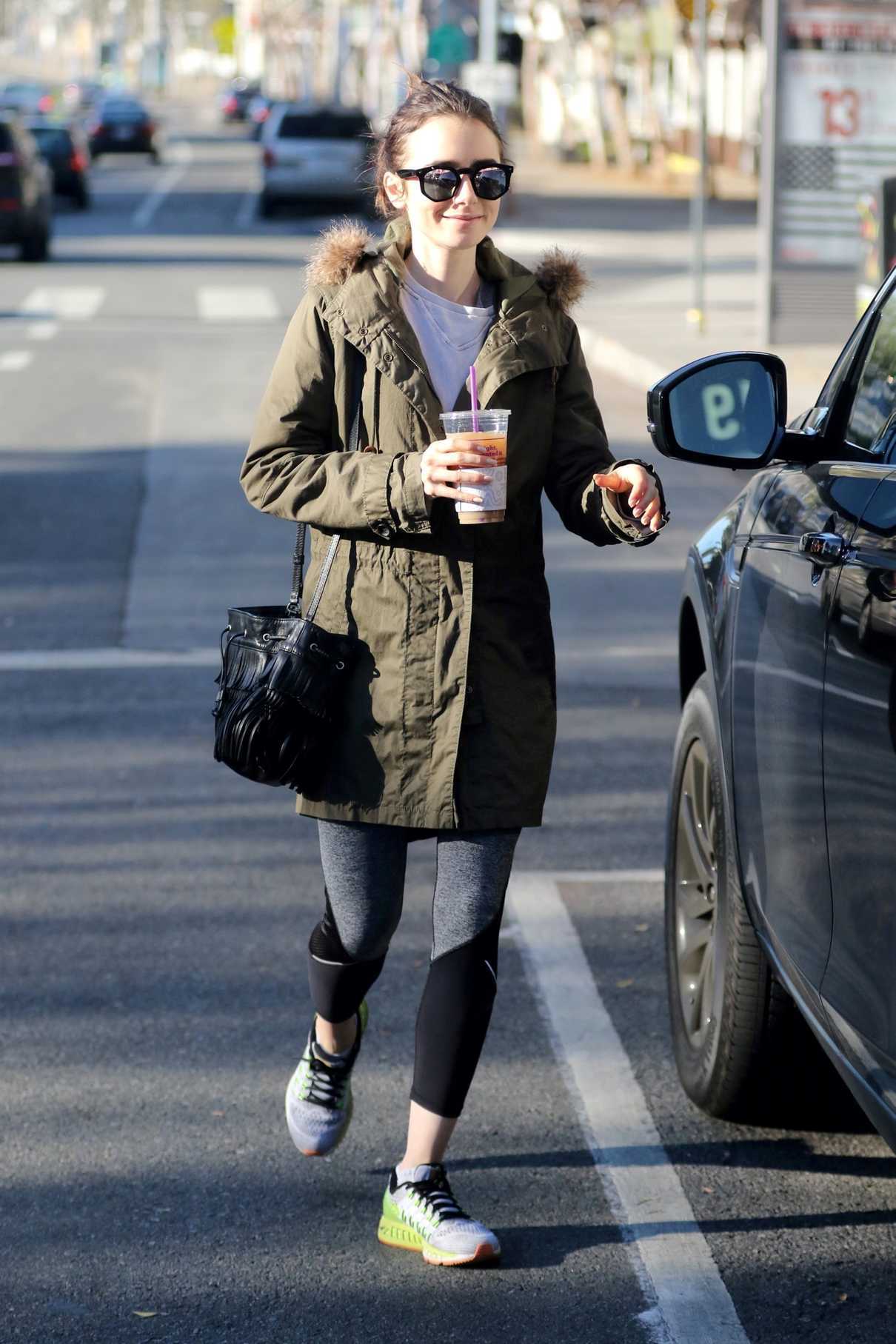 Lily Collins Wearing a Thick Coat Out in Los Angeles 12/18/2016-5