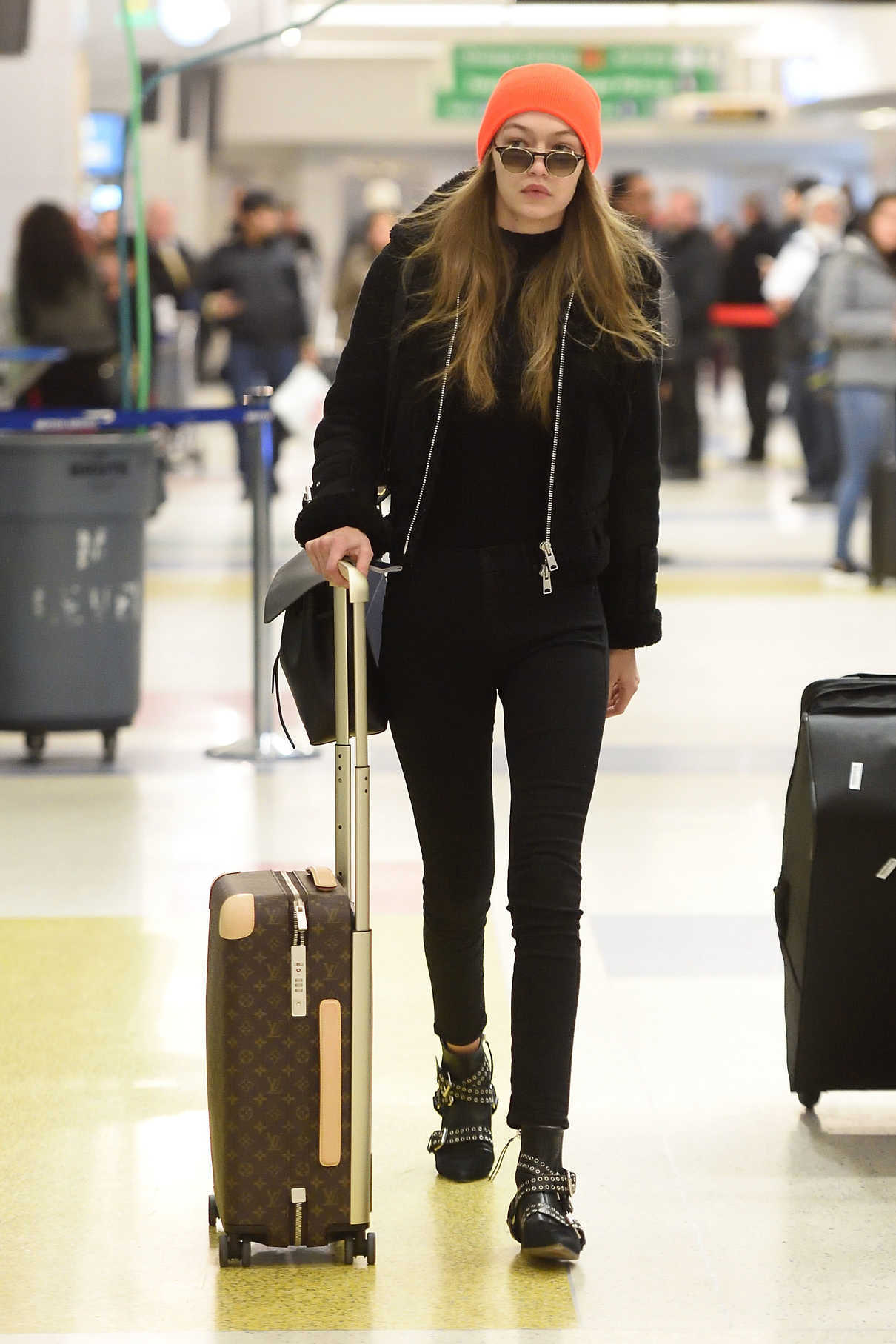 Gigi Hadid Arrives at JFK Airport in NYC 01/13/2017-2