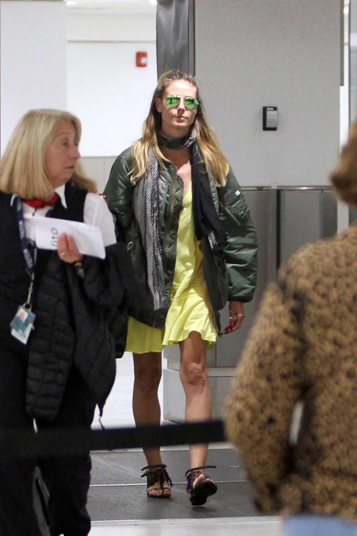 Heidi Klum Arrives at Miami International Airport 01/06/2017-5