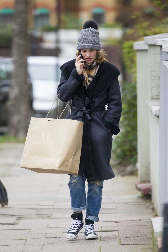 Lily James Goes Shopping in London 01/16/2017-1