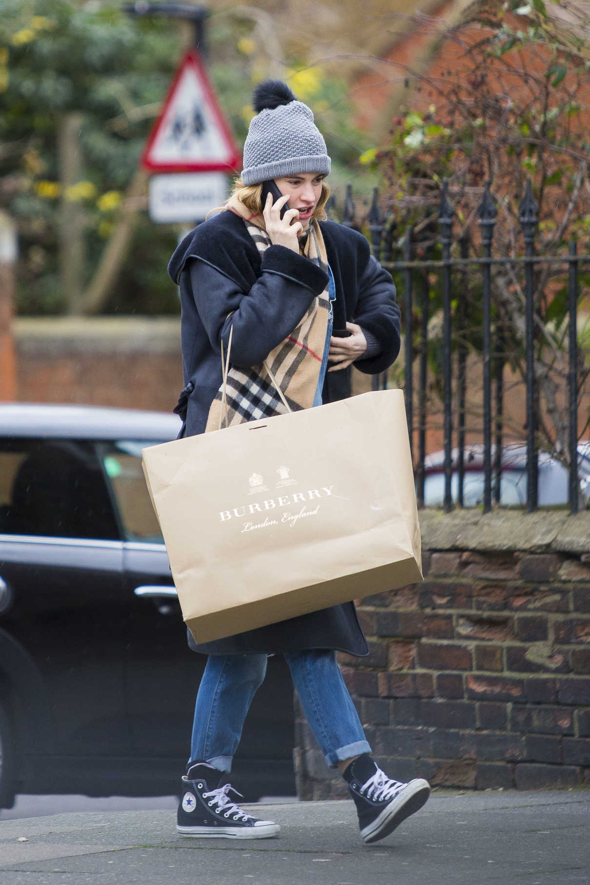 Lily James Goes Shopping in London 01/16/2017-5