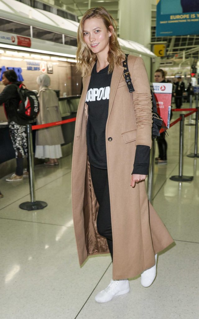 Karlie Kloss Was Seen in a Beige Coat at JFK Airport in New York City 02/28/2017-1