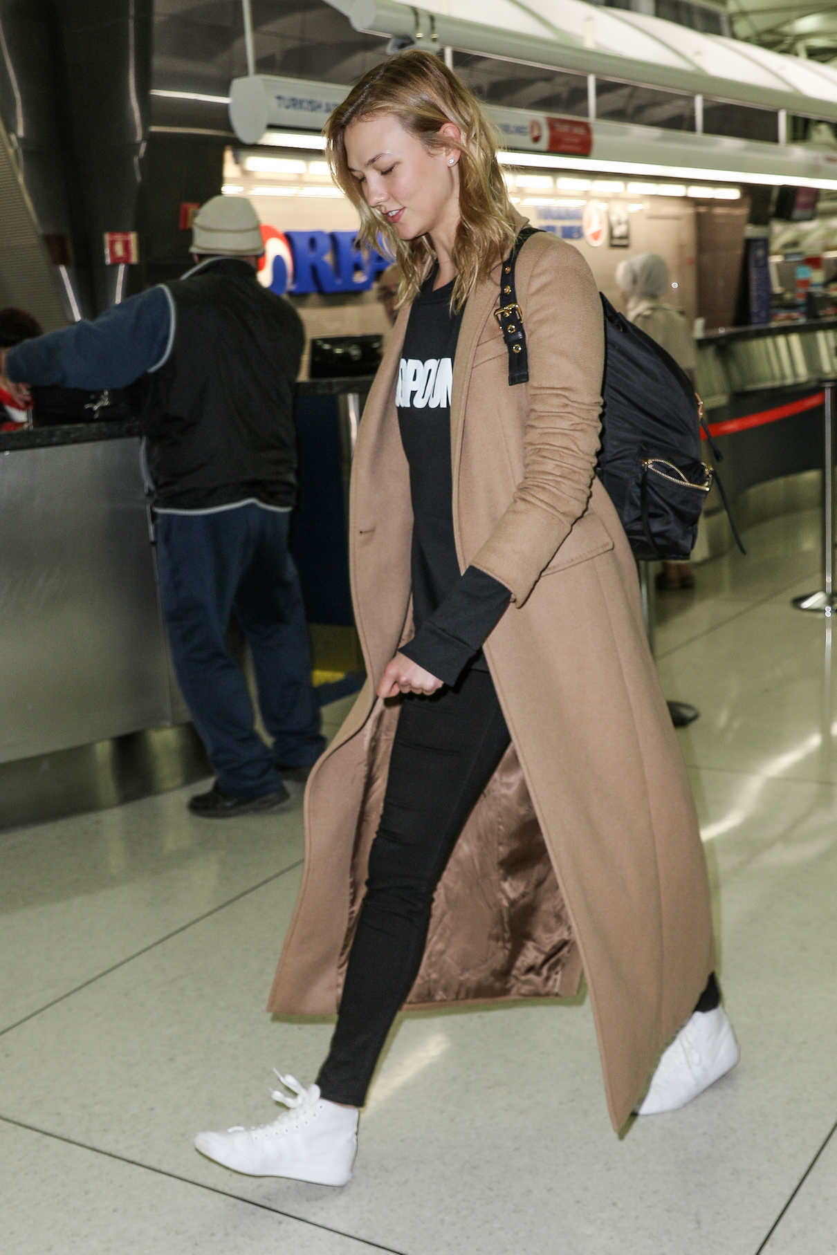 Karlie Kloss Was Seen in a Beige Coat at JFK Airport in New York City 02/28/2017-5