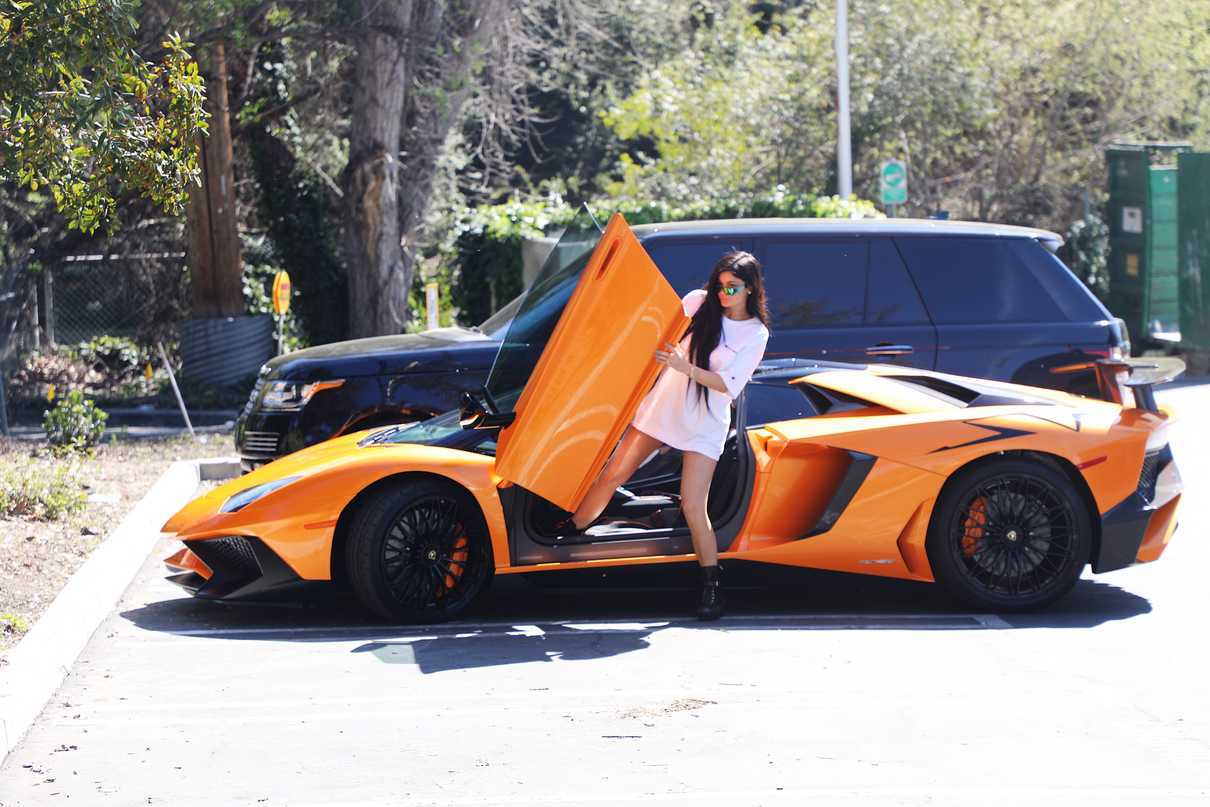 Kylie Jenner Stepping Out of Her Orange Lamborghini in Los Angeles 03/11/2017-4