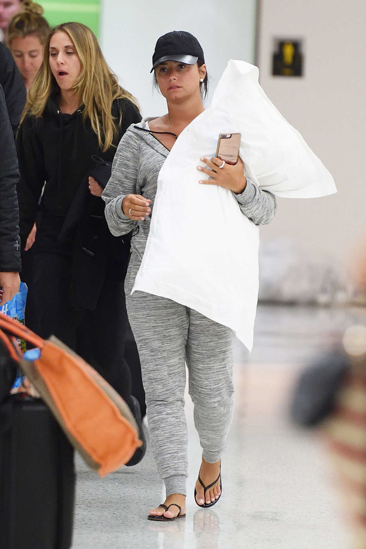Demi Lovato Carries Her Pillow at JFK Airport in New York 04/25/2017-2