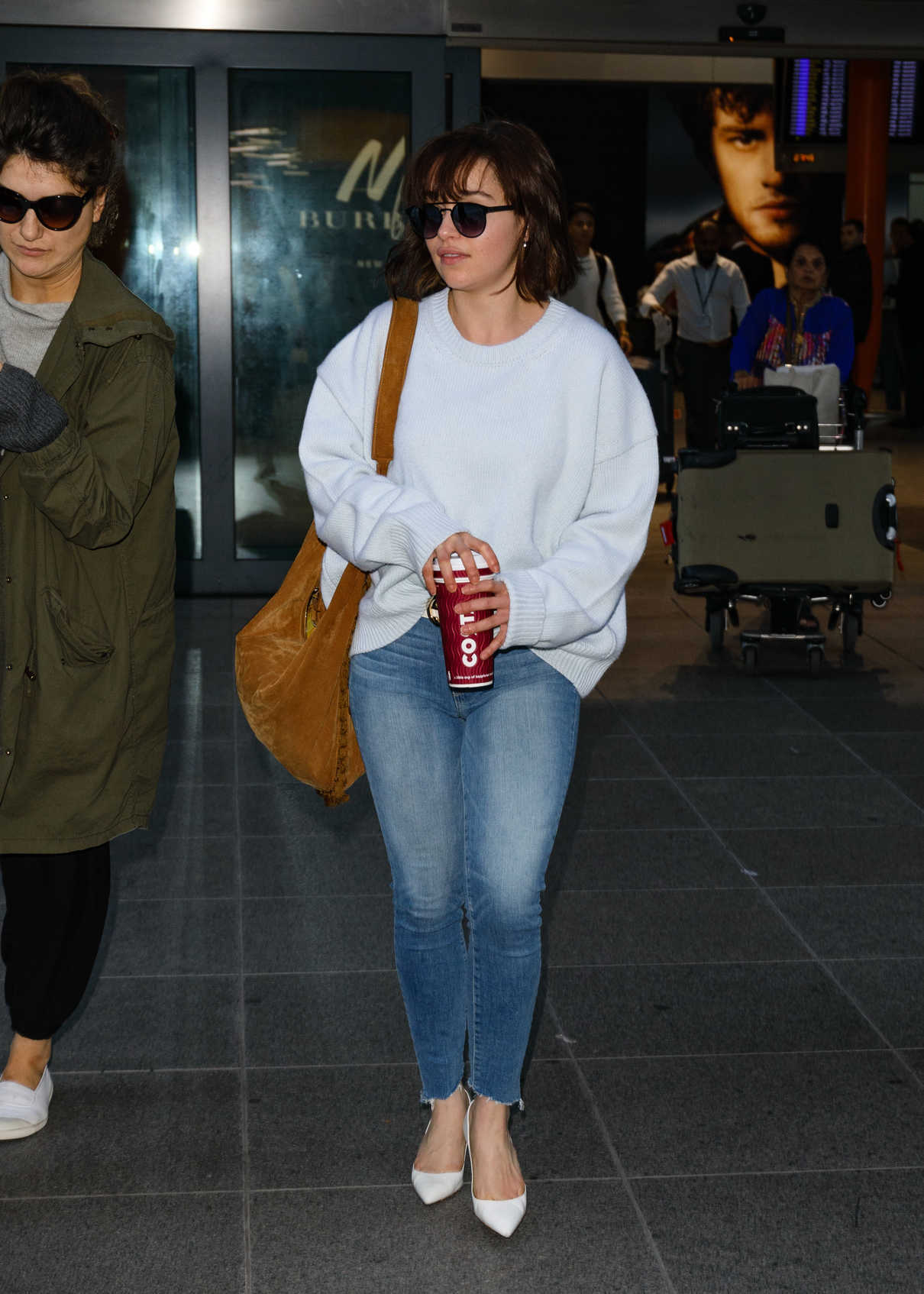 Emilia Clarke Arrives at Heathrow Airport in London 04/20/2017-3