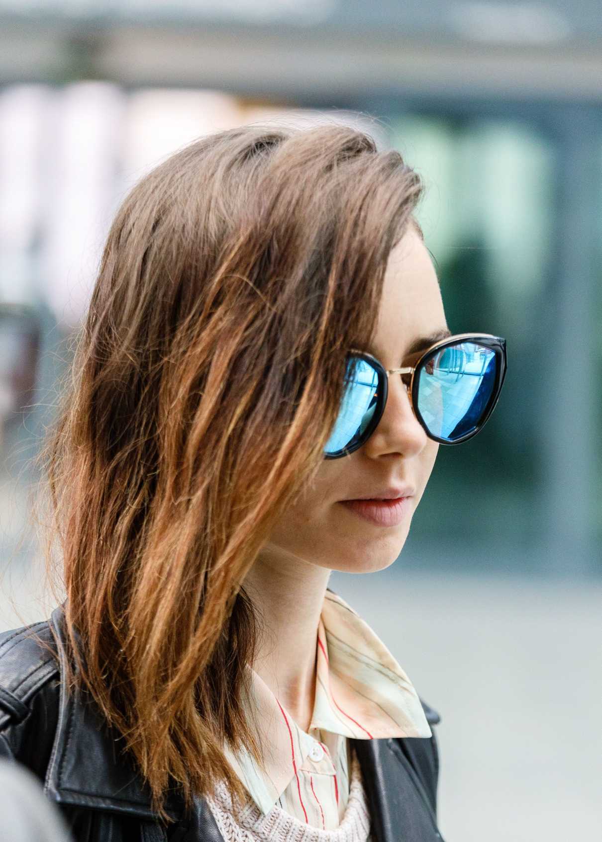 Lily Collins Arrives at Heathrow Airport in London 05/23/2017-5