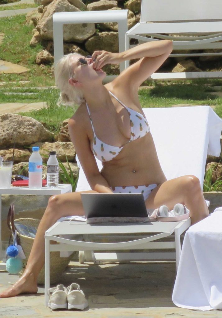 Ashley James in a Bikini by the Pool in Marbella 06/27/2017-1