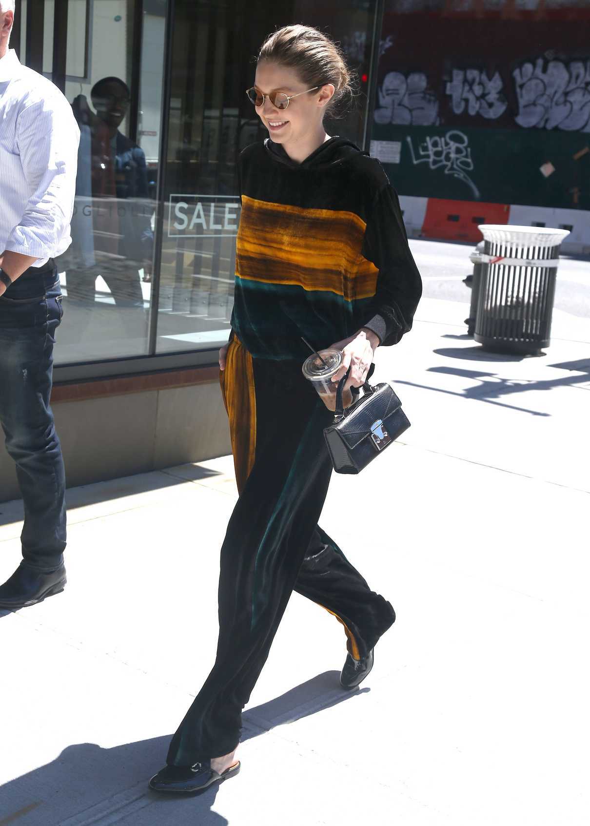 Gigi Hadid Wears a Black and Orange Outfit Out in NYC 06/20/2017-2