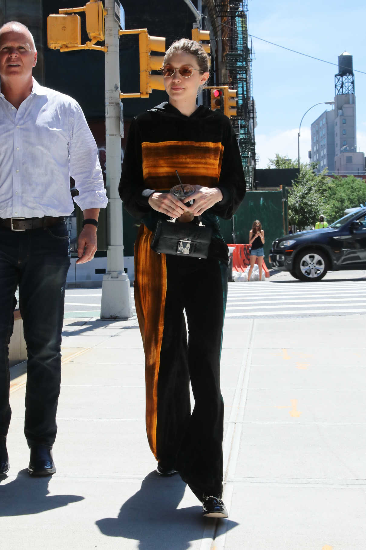 Gigi Hadid Wears a Black and Orange Outfit Out in NYC 06/20/2017-4