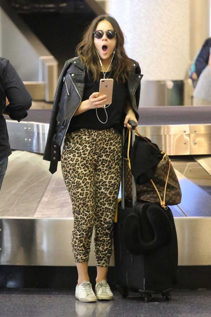 Chloe Bennet Wears a Leopard Print Pants at LAX Airport in LA 09/10/2017-1