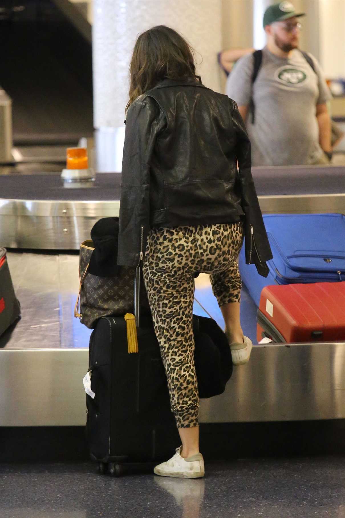 Chloe Bennet Wears a Leopard Print Pants at LAX Airport in LA 09/10/2017-5