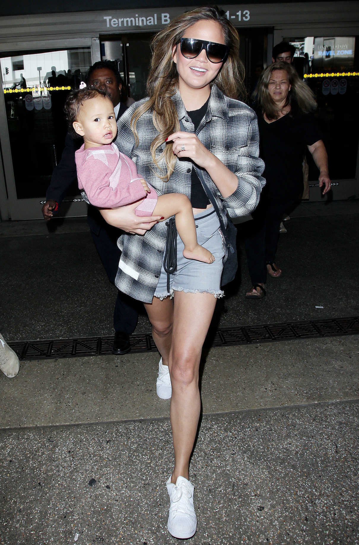 Chrissy Teigen Arrives at LAX Airport in LA With Her Daughter Luna 09/15/2017-2
