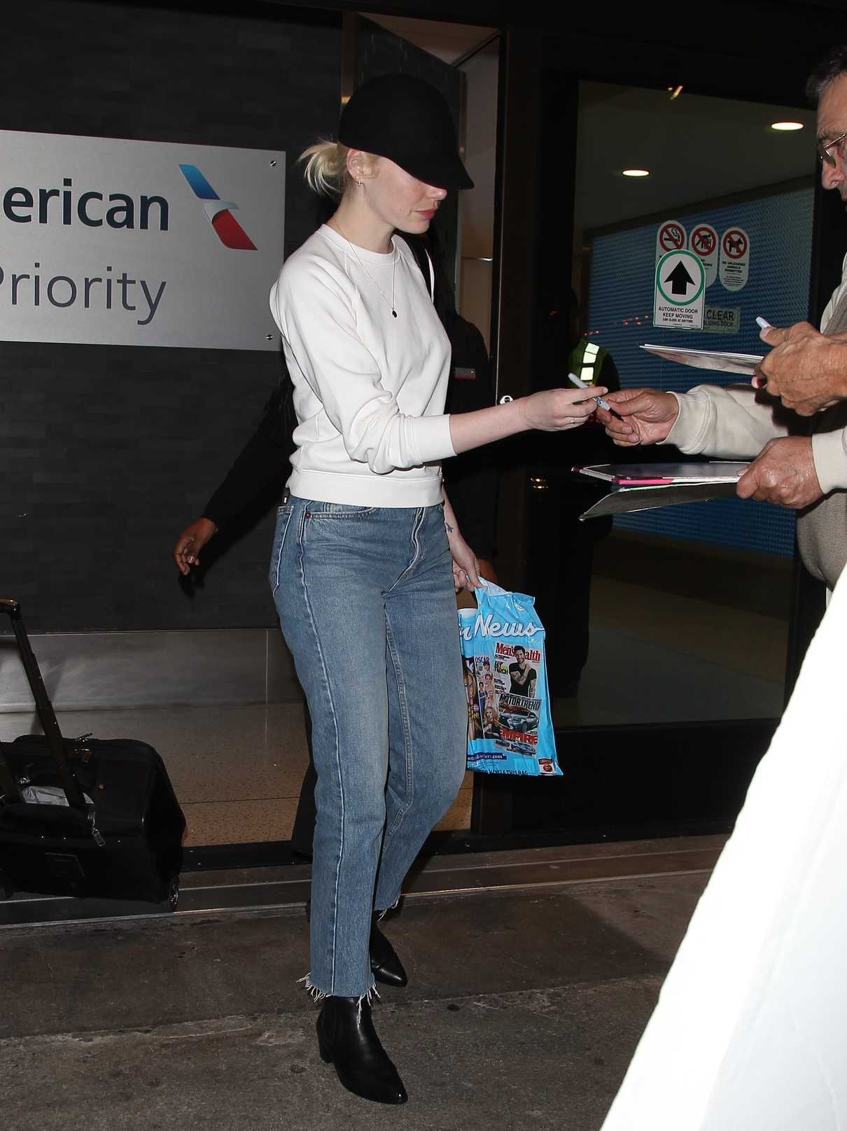 Emma Stone Touches Down at LAX Airport in LA 09/15/2017-4