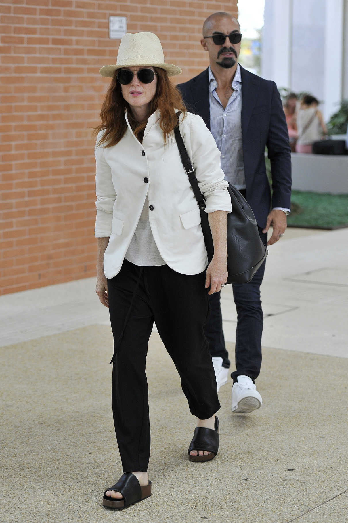 Julianne Moore Arrives at Venice Airport in Venice 08/31/2017-2