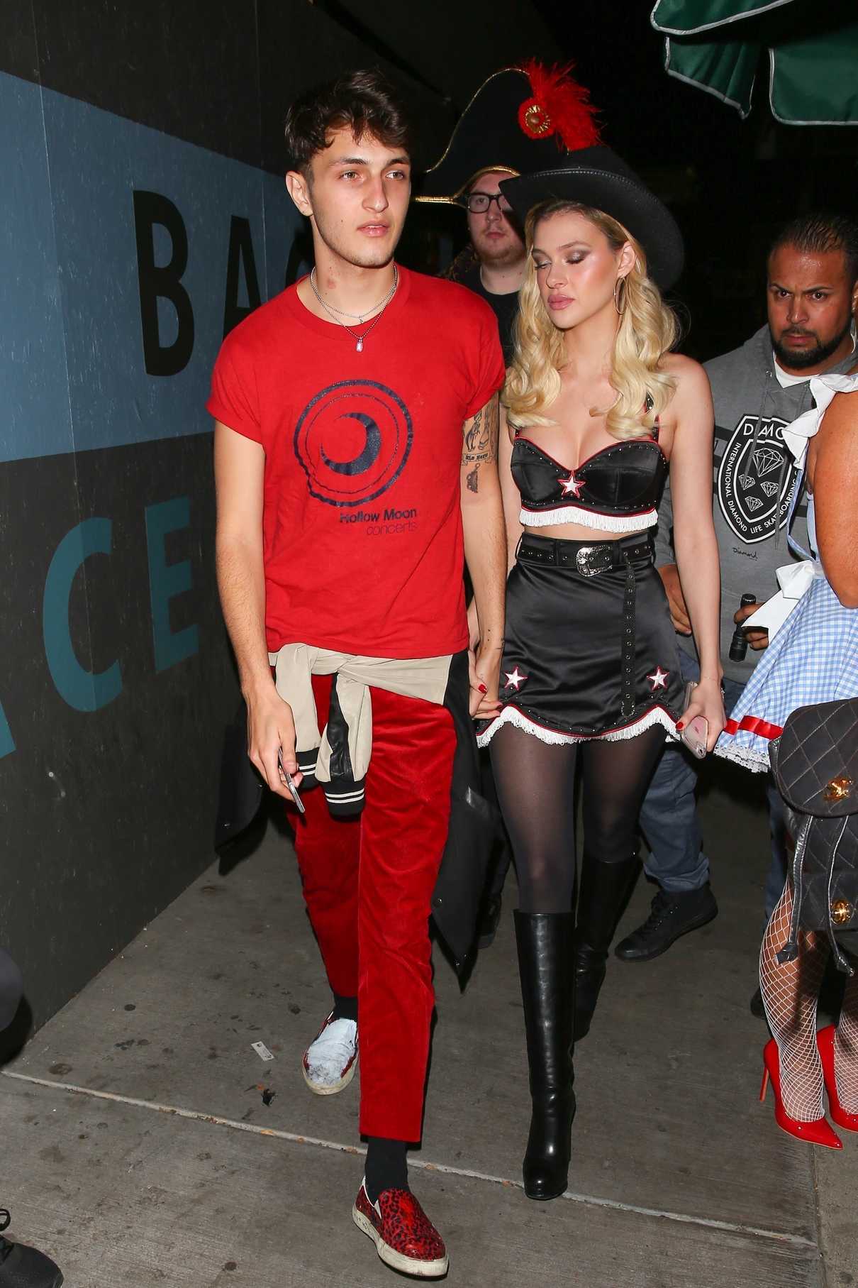 Nicola Peltz Arrives With Anwar Hadid at Matthew Morrison's 8th Annual Halloween Party in West Hollywood 10/28/2017-2