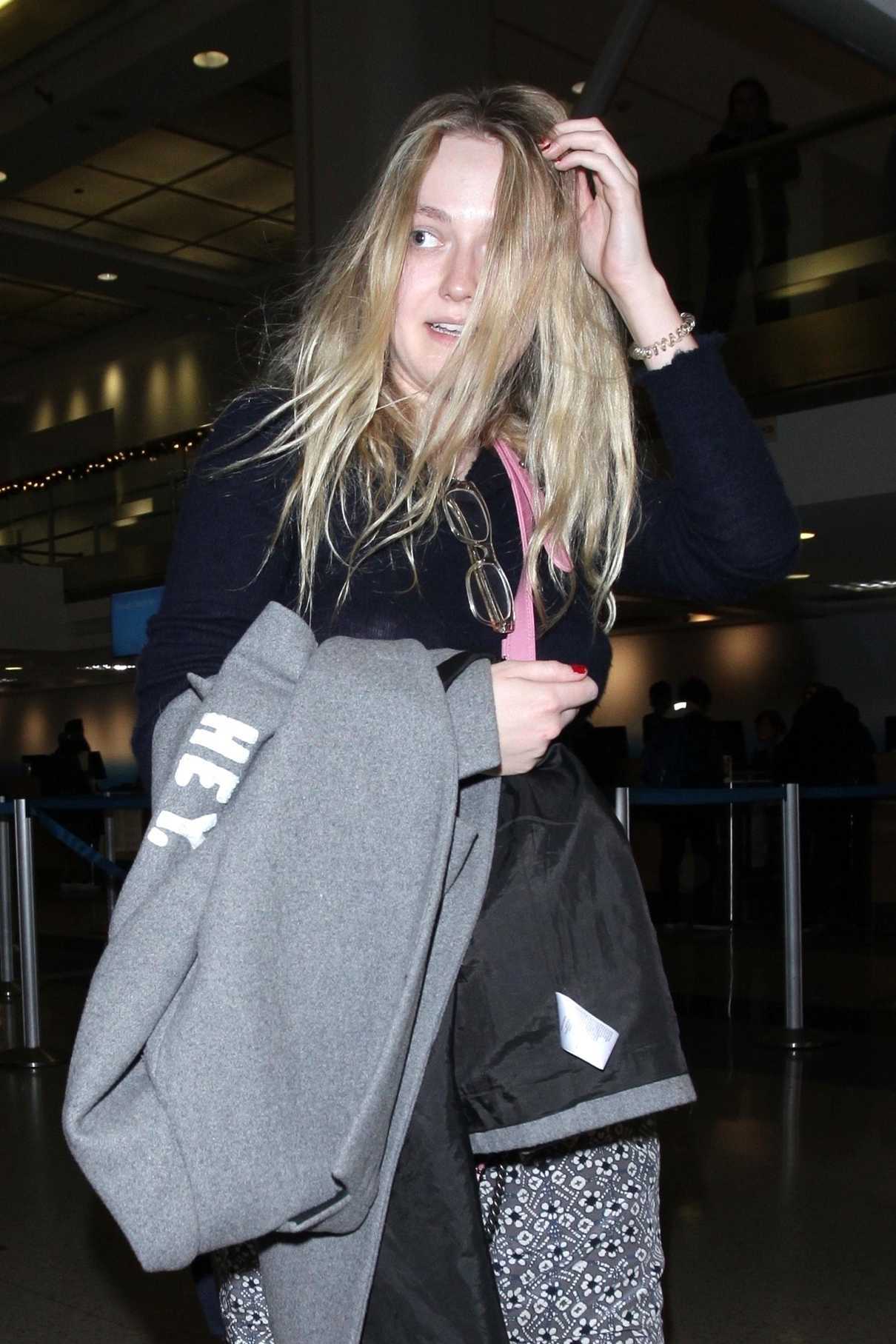 Dakota Fanning Was Spotted at LAX Airport in LA 12/19/2017-5