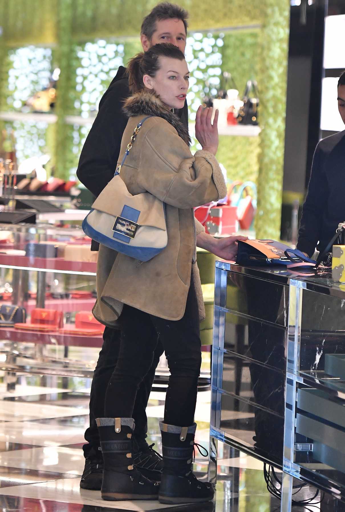 Milla Jovovich Goes Shopping at the Prada Store in Beverly Hills 12/21/2017-3