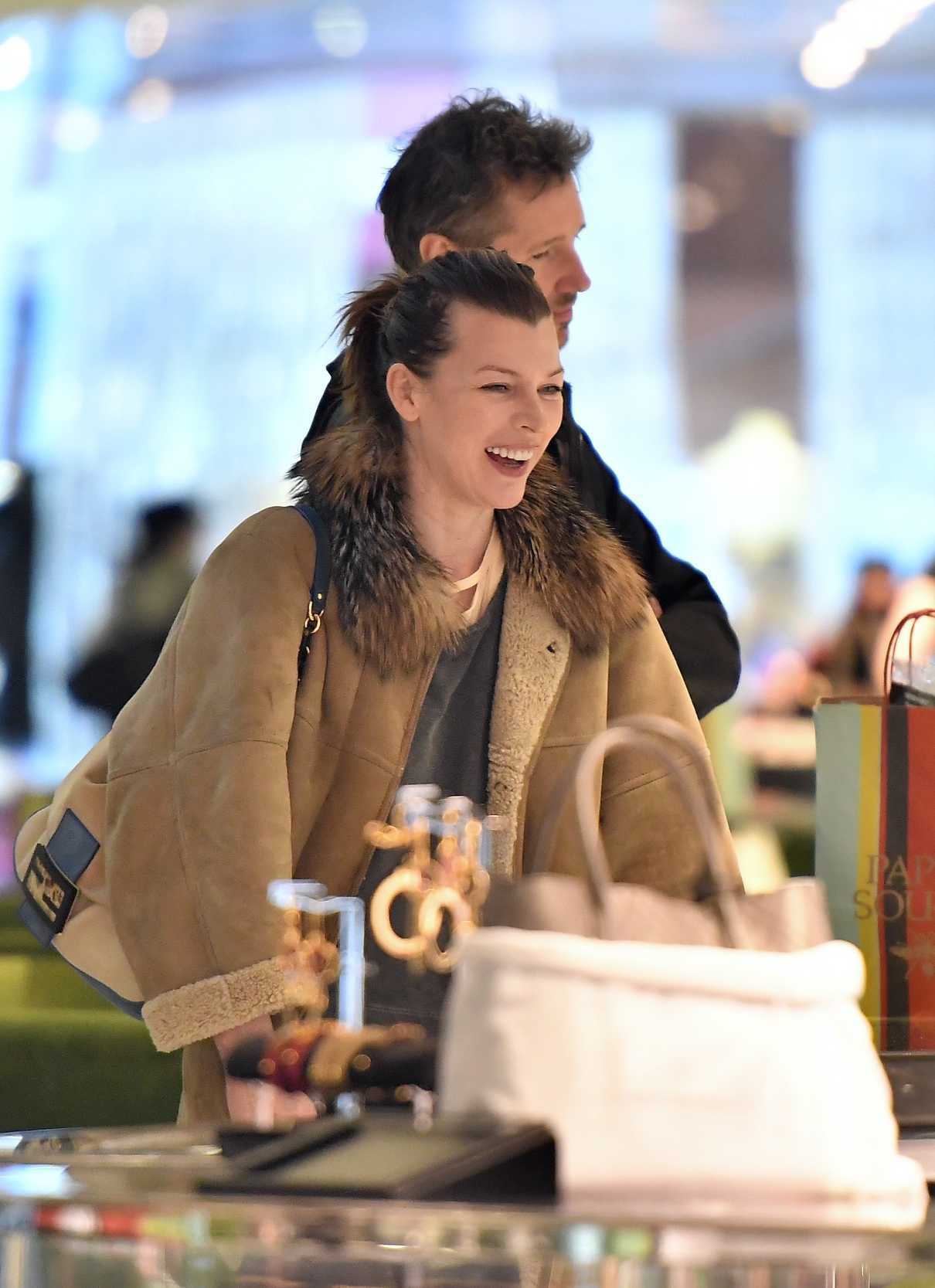 Milla Jovovich Goes Shopping at the Prada Store in Beverly Hills 12/21/2017-5
