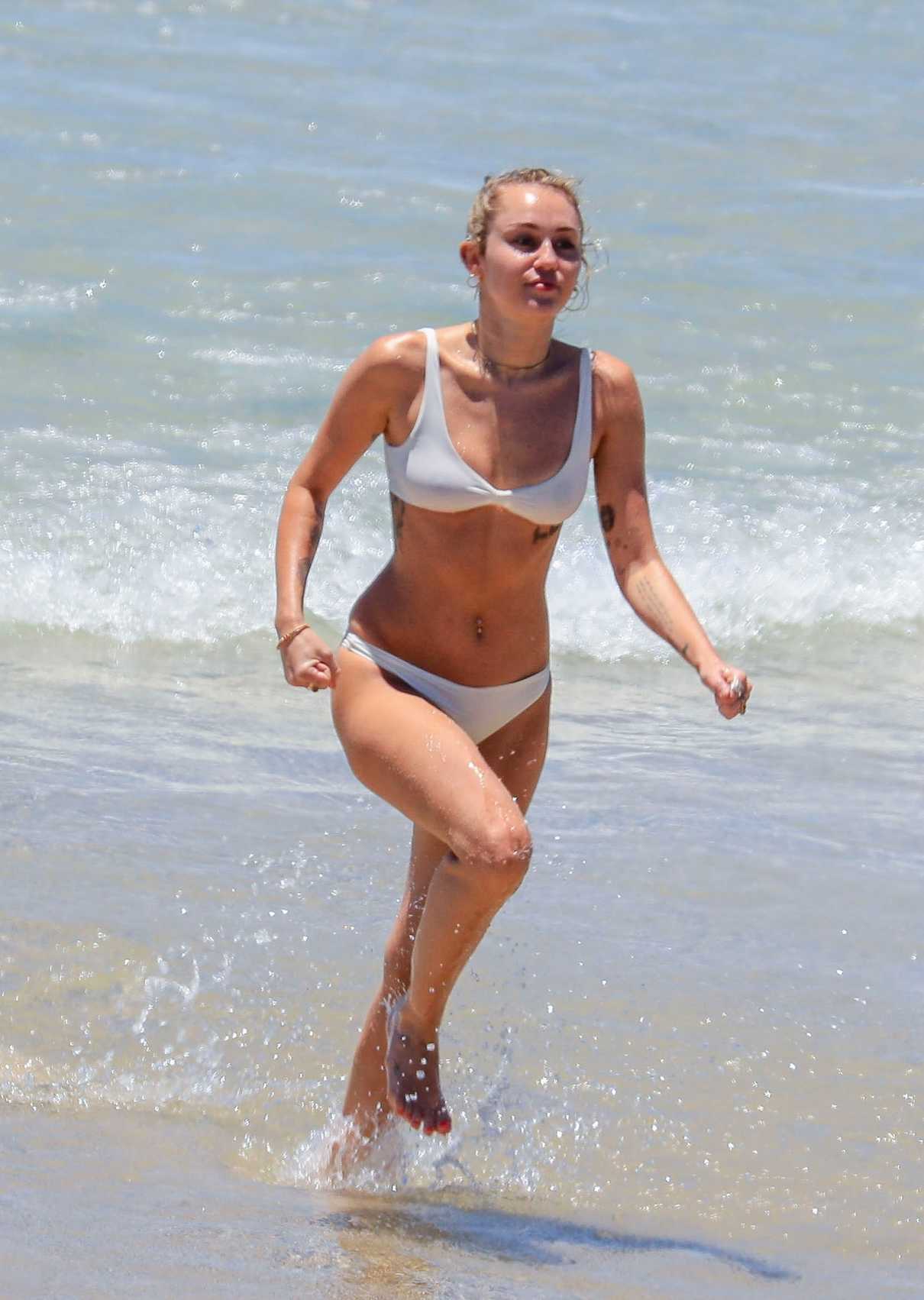 Miley Cyrus in Bikini at the Beach with Liam Hemsworth in Byron Bay, Australia 01/15/2018-3