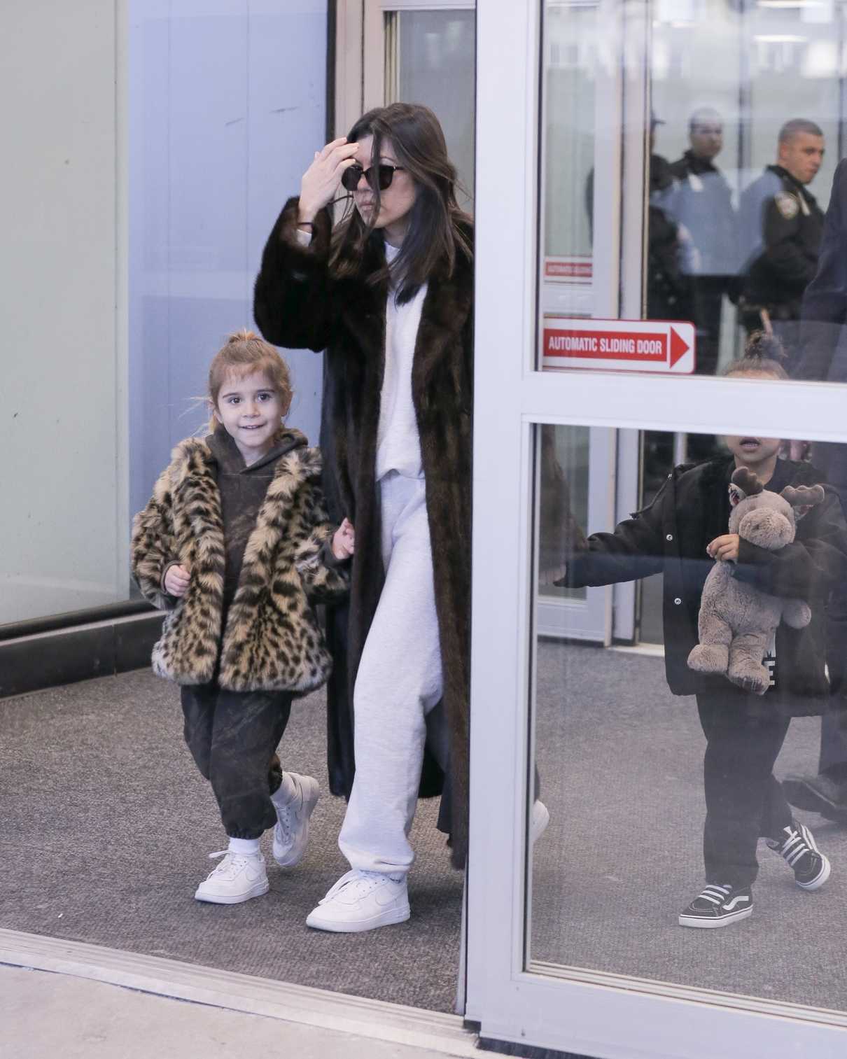 Kourtney Kardashian Arrives at JFK Airport with Penelope Disick and North West in New York 02/02/2018-2