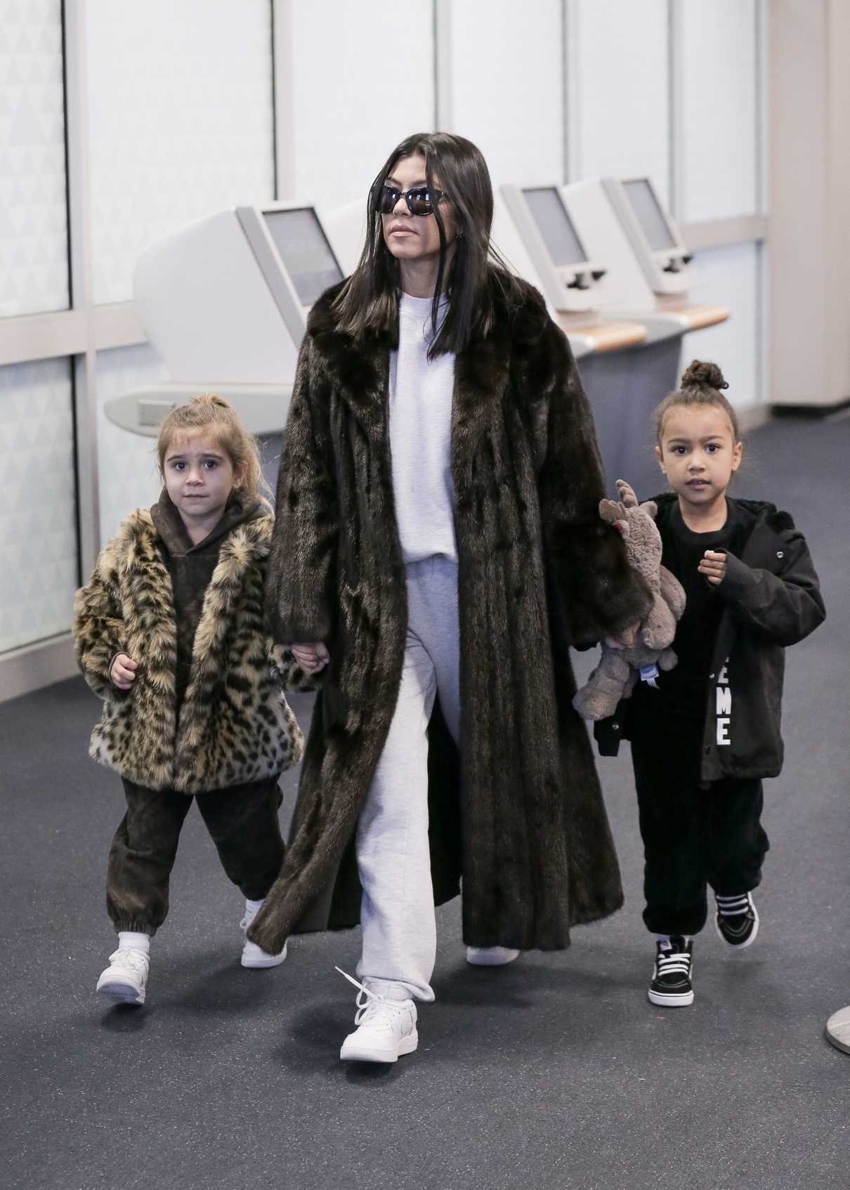 Kourtney Kardashian Arrives at JFK Airport with Penelope Disick and North West in New York 02/02/2018-3