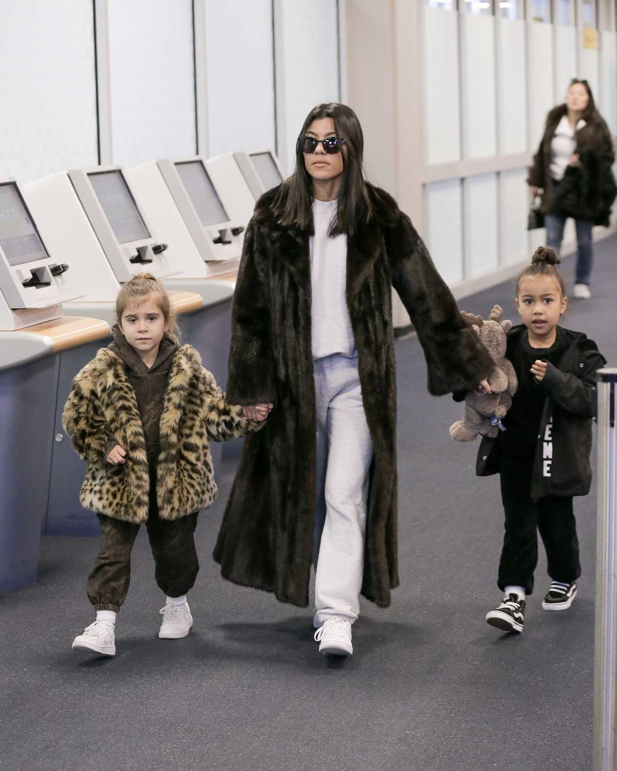 Kourtney Kardashian Arrives at JFK Airport with Penelope Disick and North West in New York 02/02/2018-4