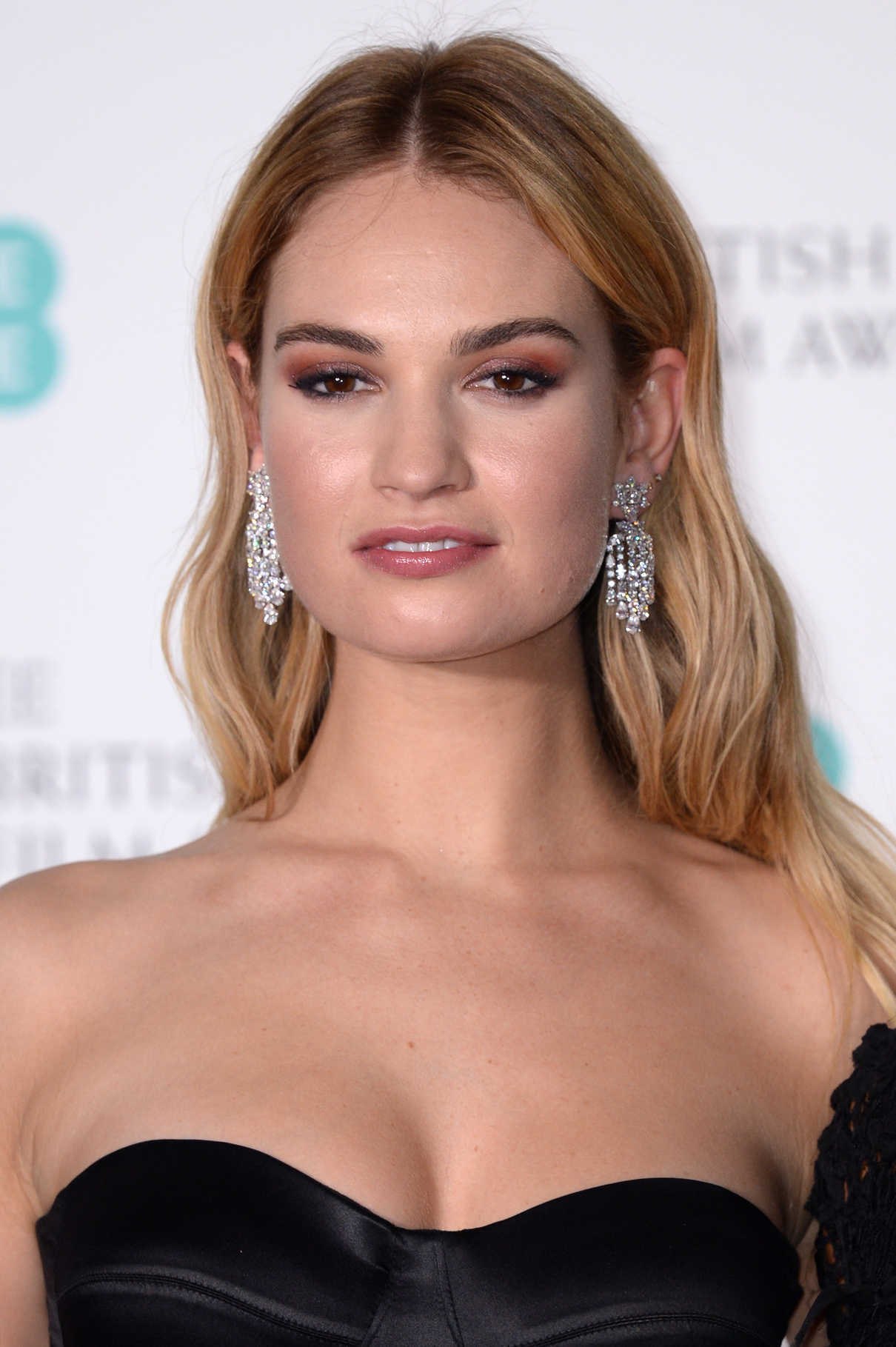 Lily James at the 71st British Academy Film Awards at Royal Albert Hall in London 02/18/2018-5