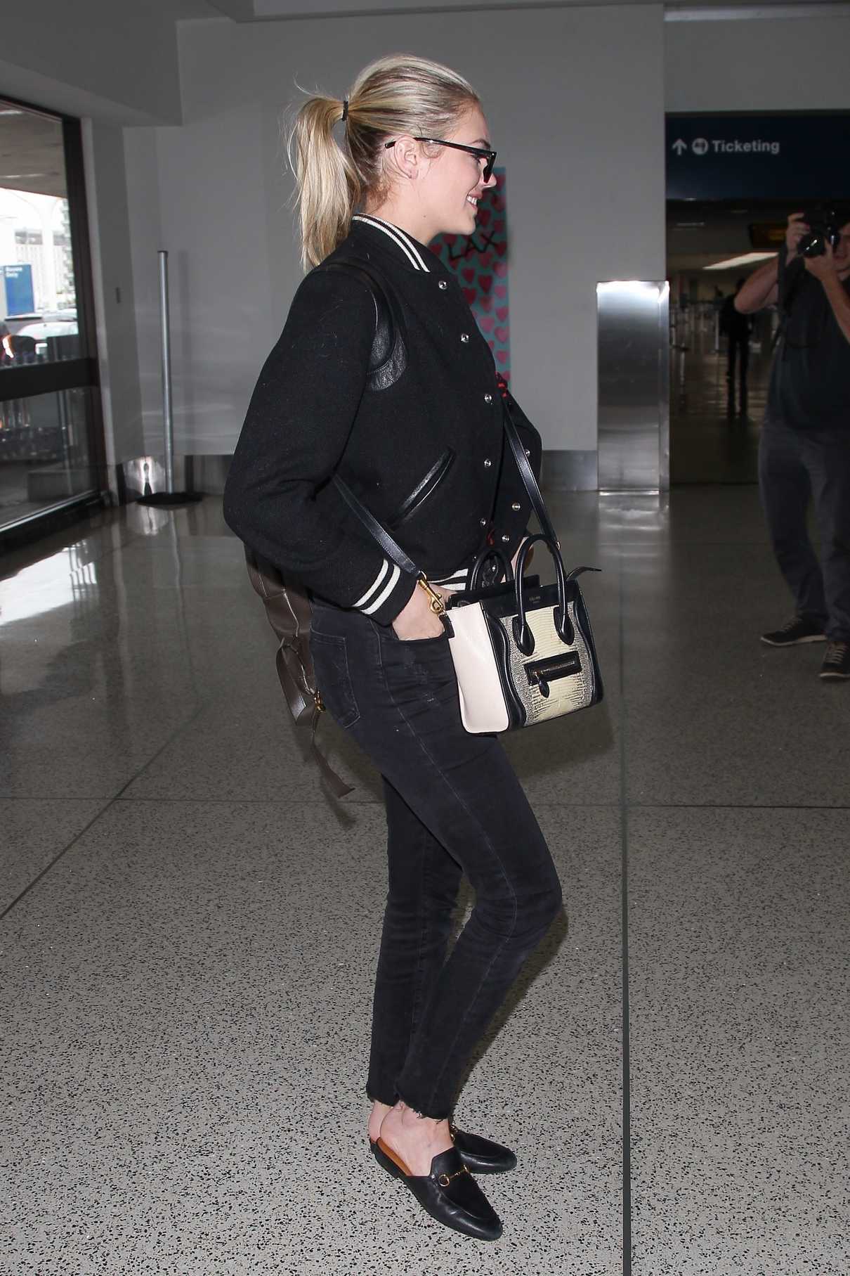 Kate Upton Wears a Stylish Varsity Jacket at LAX Airport in Los Angeles 03/08/2018-5