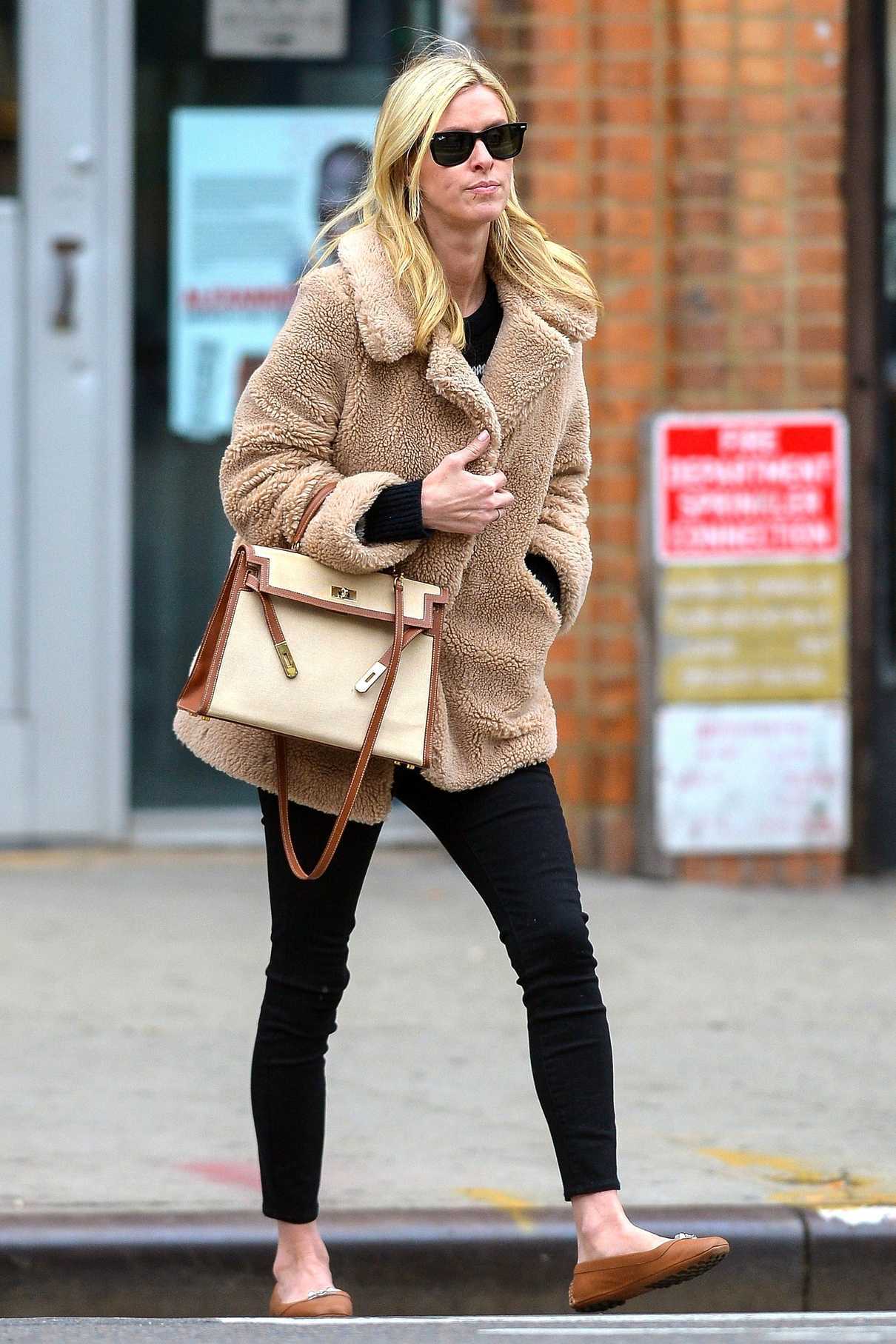 Nicky Hilton Wears a Beige Fur Coat Out in New York City 03/28/2017-2