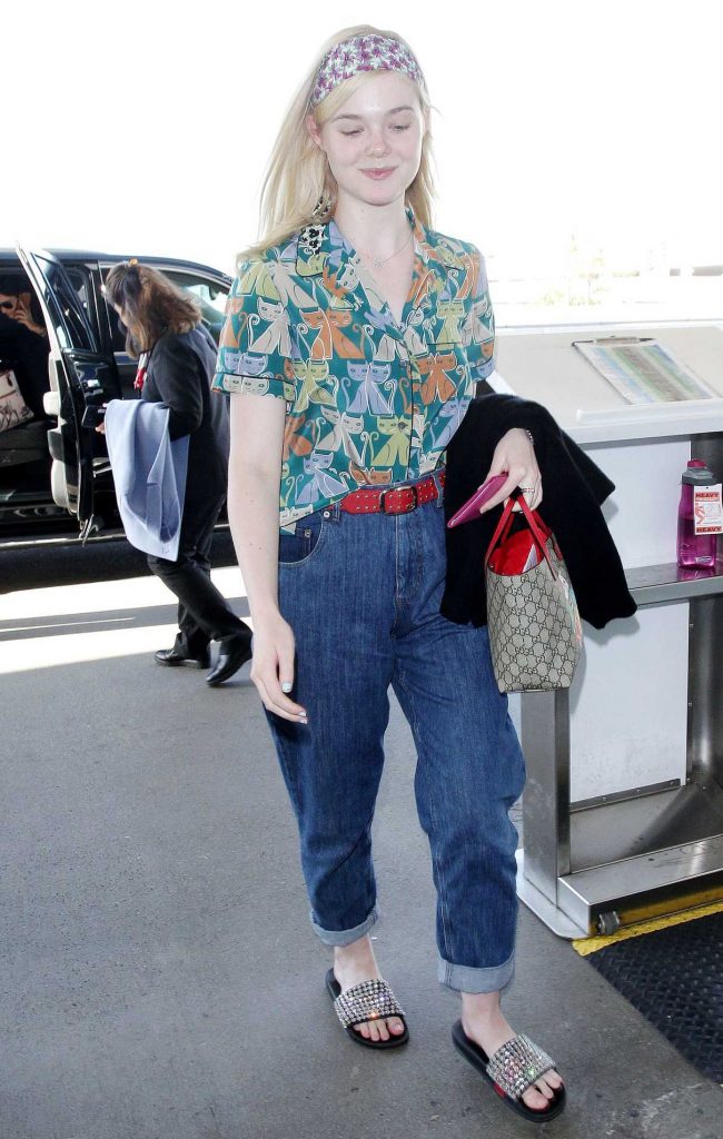 Elle Fanning Wears a Colorful Cat Patterned Shirt at LAX Airport in LA 04/20/2018-1