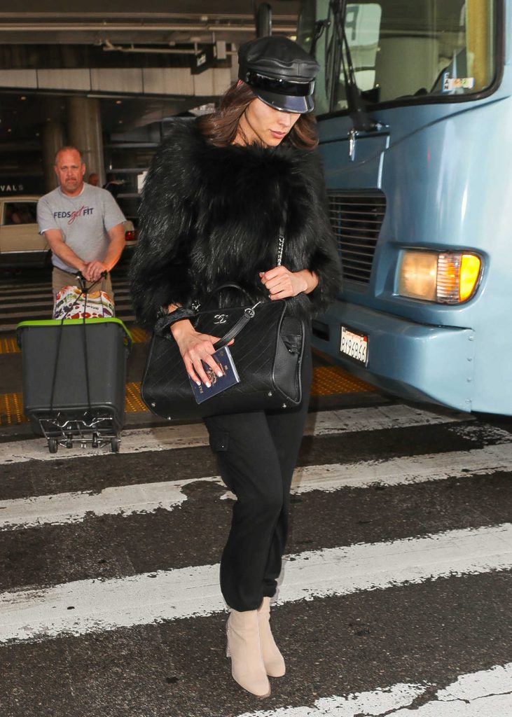 Olivia Culpo Wears a Black Captain Hat at LAX Airport in Los Angeles 04/11/2018-1