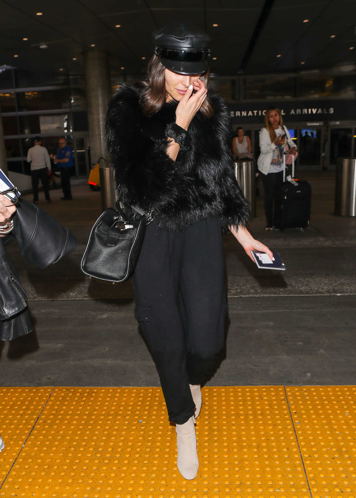 Olivia Culpo Wears a Black Captain Hat at LAX Airport in Los Angeles 04/11/2018-5