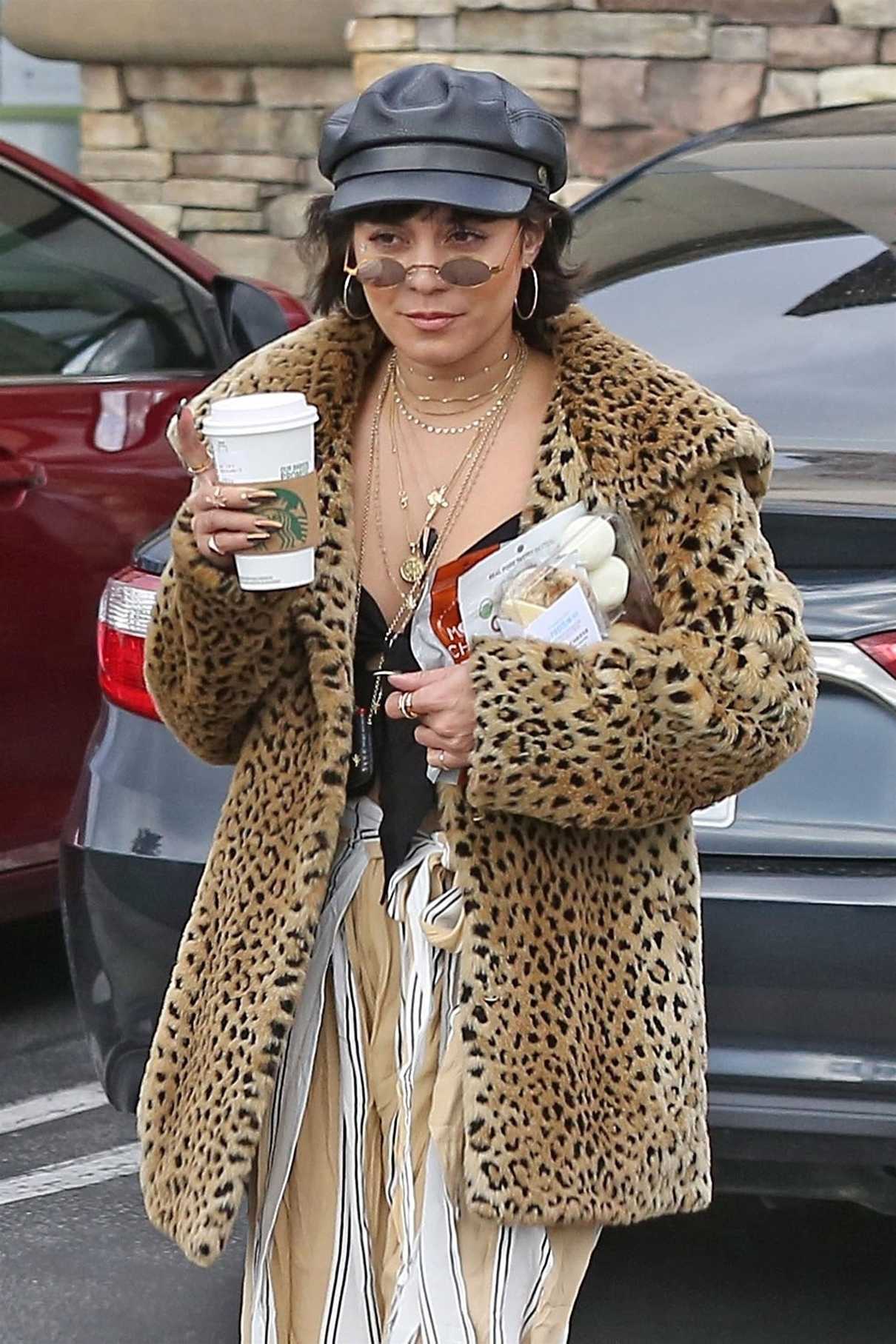 Vanessa Hudgens Stops at Starbucks in Los Angeles 04/19/2018-4