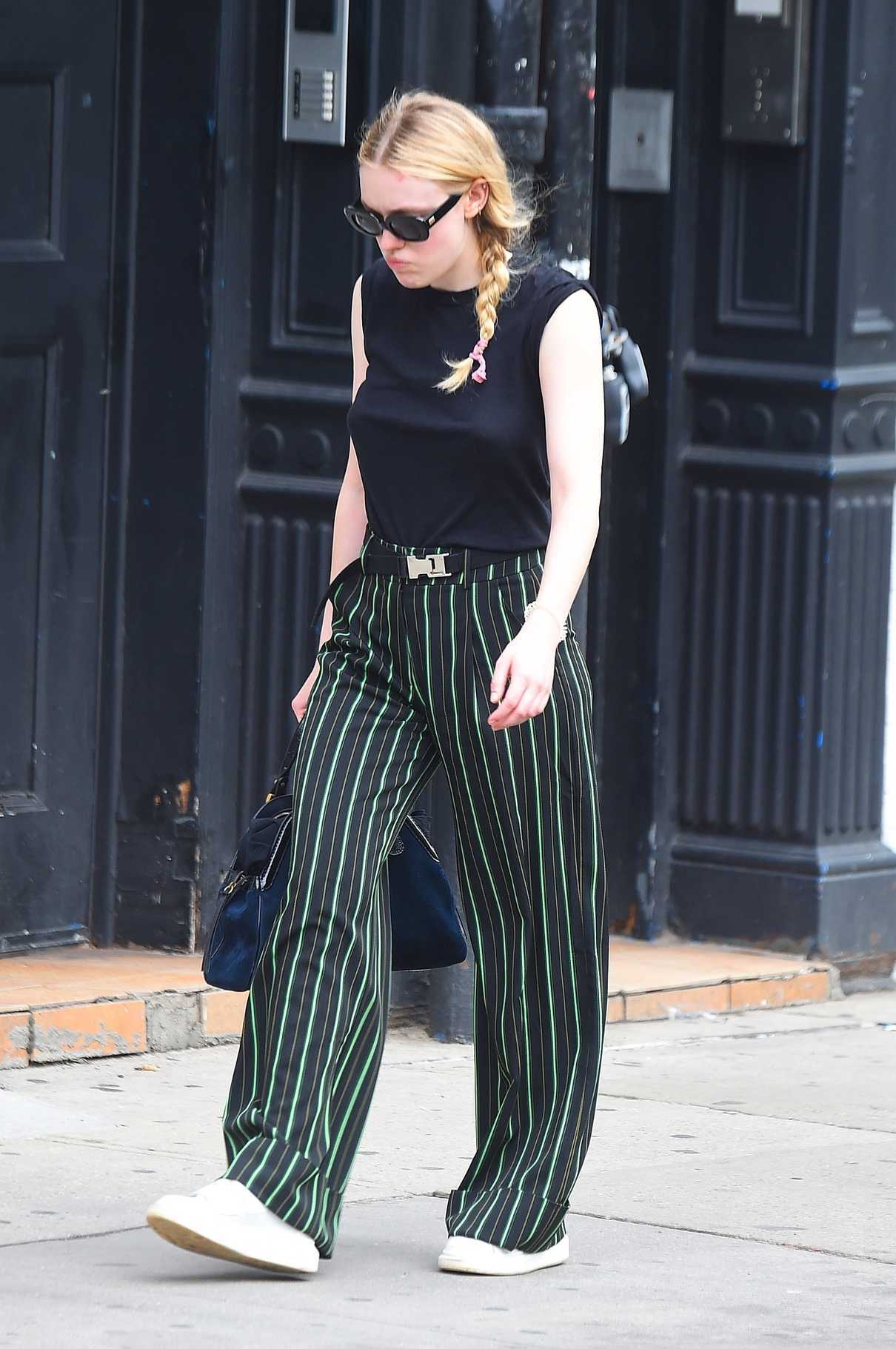 Dakota Fanning Wears a Striped Pants Out in NYC 05/17/2018-4