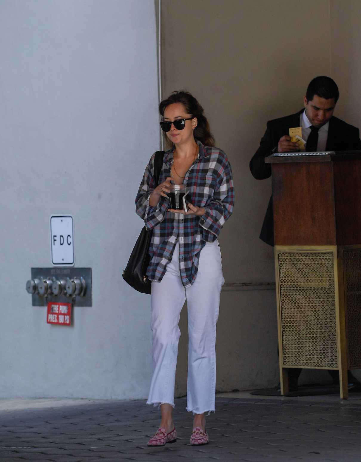 Dakota Johnson Leaves a Late Lunch at The Sunet Tower in West Hollywood 05/25/2018-3