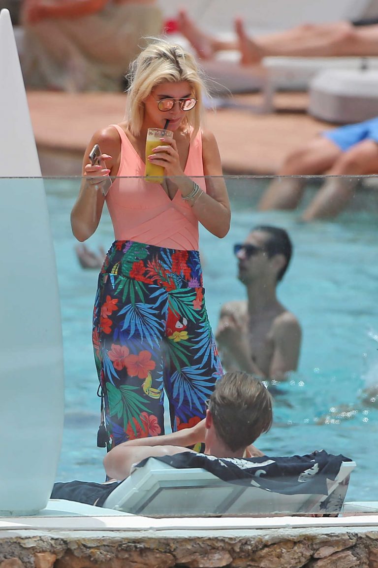 Ashley James Wears a Peach Coloured Swimsuit by the Pool in Ibiza 06/06